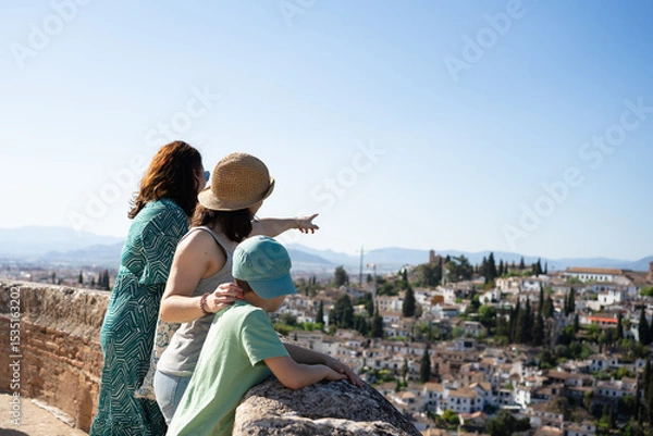 Fototapeta Family enjoying panoramic view of granada, spain