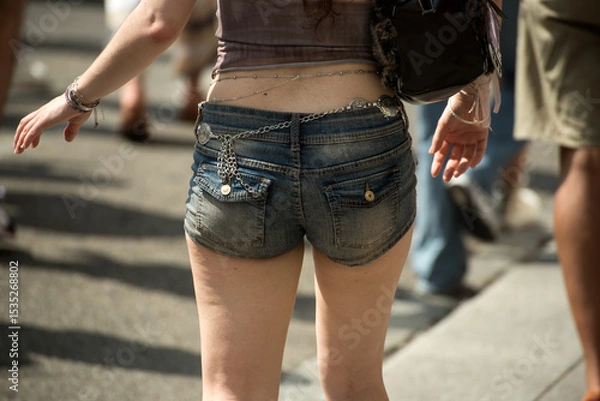 Obraz Closeup of mini jeans short on woman in the street