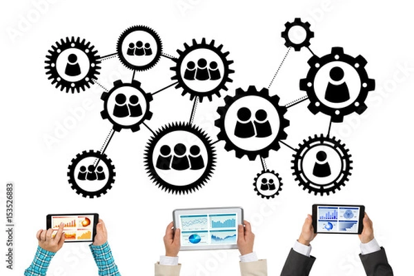 Fototapeta Top view of businesspeople sitting at table and using gadgets