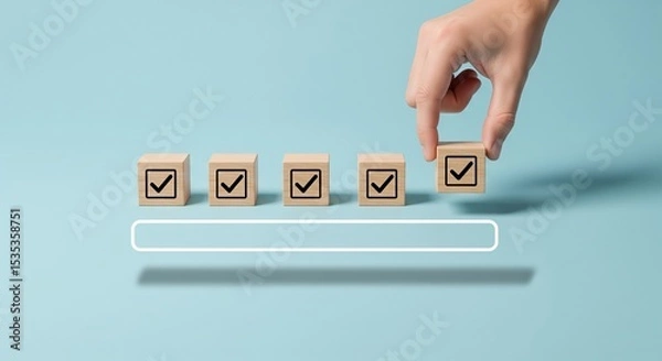 Fototapeta Checklist and task progress tracking concept. A hand placing the final checkmark on wooden blocks in a progress bar, task completion, productivity, goal setting, and efficient project management. 