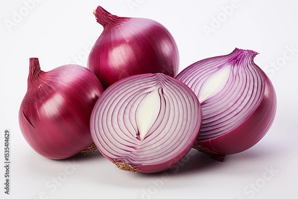 Fototapeta Two whole red onions and two halved purple onions on a white background.
