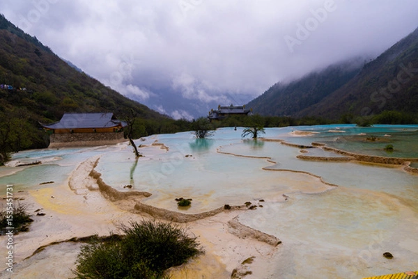 Fototapeta Huanglong National Park, blue water in limestone wells is a landmark for tourists to visit in Ngawa Tibetan and Qiang in Sichuan, China