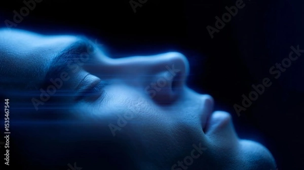 Fototapeta A serene profile of a person in soft blue light. The image captures a dreamlike essence and calm demeanor. Perfect for modern art and digital concepts. Elegant and ethereal style. AI