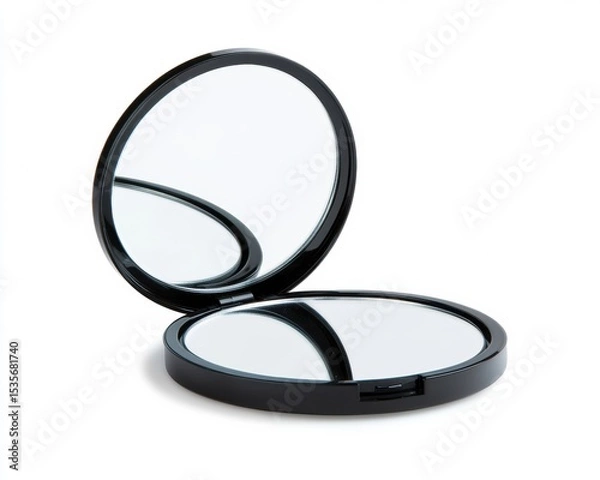 Fototapeta A sleek, round black compact mirror opened to show two reflective surfaces on a white background.