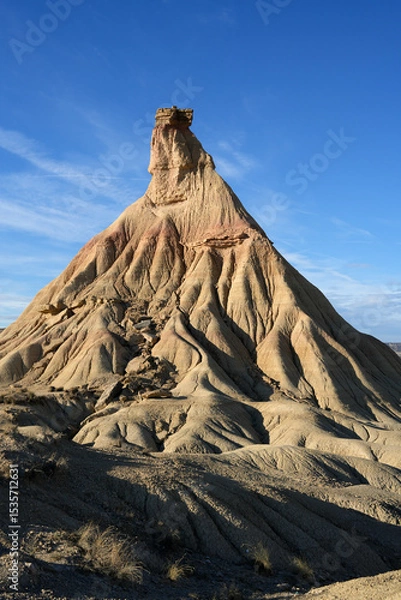 Fototapeta Rock sandstone and clay formations in the half desert of Bardenas Reales in the Navarra province of Spain