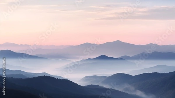 Obraz A soft, muted sunrise over the Carpathians, delicate peach and lavender tones blending across the sky, mist-covered valleys and silhouetted mountain ridges creating a peaceful, tranquil scene.