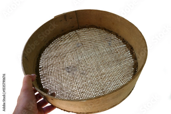 Fototapeta a fine-mesh sieve made of leather for sifting grain,