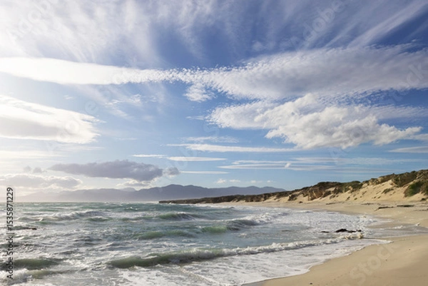 Fototapeta Empty Sandy Ocean Shoreline at Calm Day