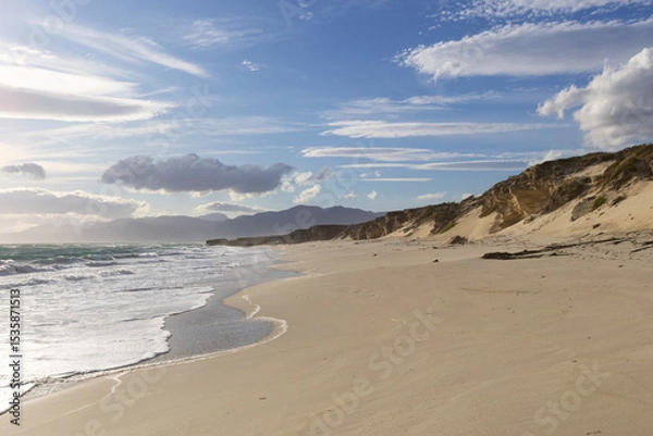 Fototapeta Empty Sandy Ocean Shoreline at Calm Day