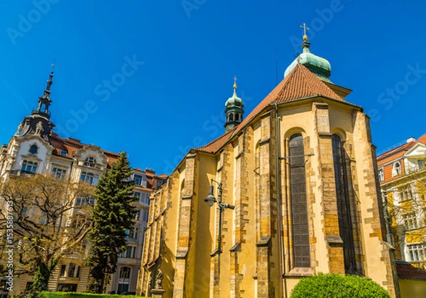 Fototapeta A view of buildings on the northwest corner of the old town square in central Prague in springtime
