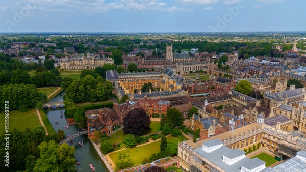 Fototapeta Panoramic view of Cambridge University with its traditional architecture, green spaces, and the River Cam flowing through the city center