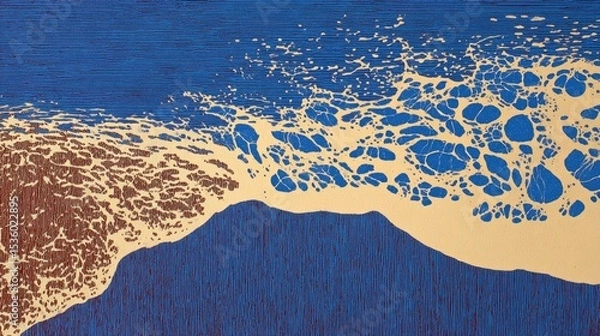 Fototapeta Gentle waves roll onto the shore, creating intricate foam patterns on the sandy beach under a clear blue sky, highlighting the beauty of nature in a coastal environment.