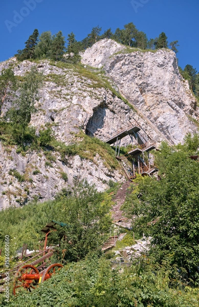 Fototapeta Mountain with the Bolshaya Tavdinskaya Cave in Altai.