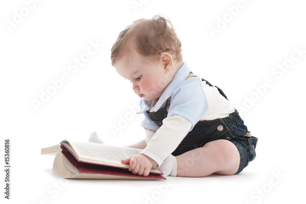 Obraz Two years old cute boy reading a book