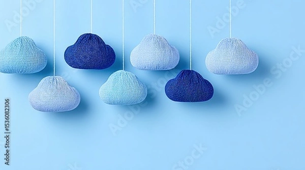 Fototapeta Knitted clouds in varying shades of blue.