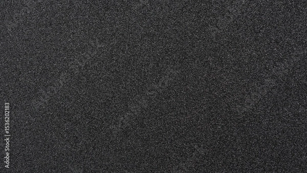 Fototapeta Shiny wrapper paper. black sandpaper texture background. 
