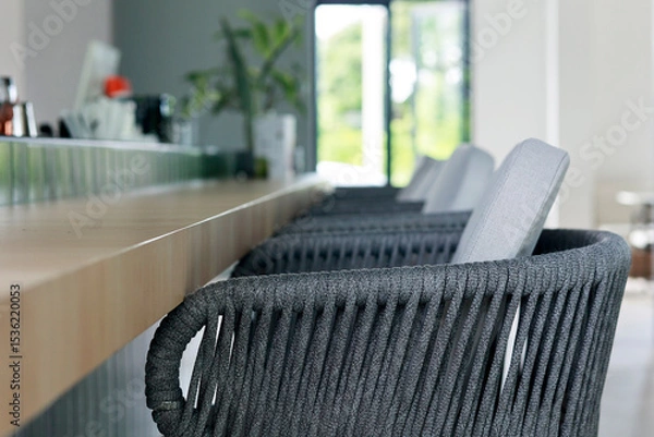 Fototapeta bar stool with cushion  at a bar counter