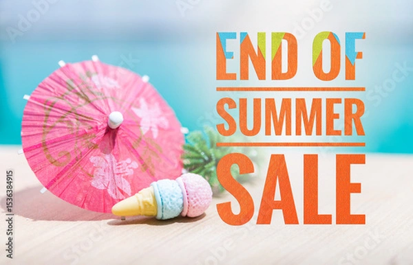 Obraz End of summer sale banner over summer set background, Mini Ice cream cone with paper umbrella on swimming pool edge over blue water background, summer season promotion poster background idea