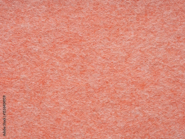 Fototapeta Warm coral hues blend in a soft, textured embrace, evoking comfort and simplicity in visual harmony