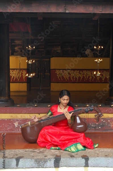 Obraz Dziewczyna grająca Veena