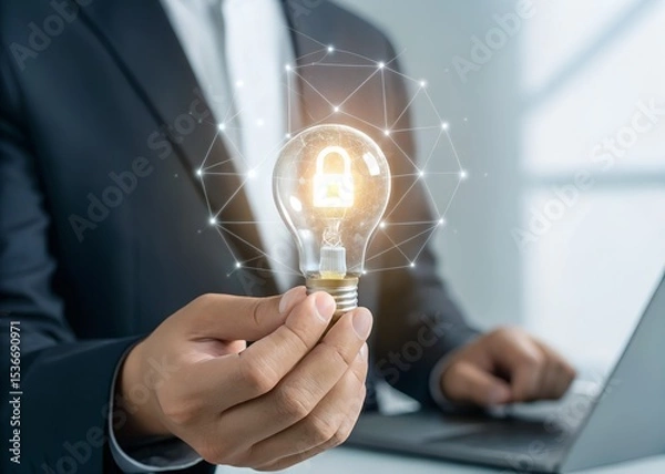 Obraz Cybersecurity Protection, Security Concept. Hands of businessman holding light bulb and cybersecurity icon with data network digital technology. Ensuring Data Integrity and Confidentiality.