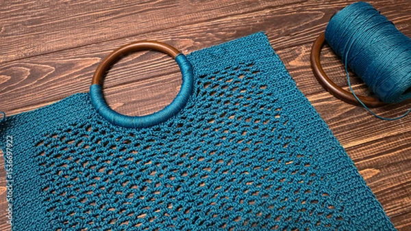 Obraz Knitting a product from a cord with a crochet hook. Step-by-step instructions