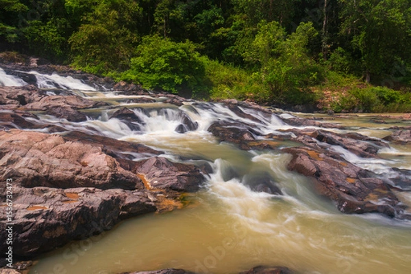 Obraz waterfall cascades over the rocks