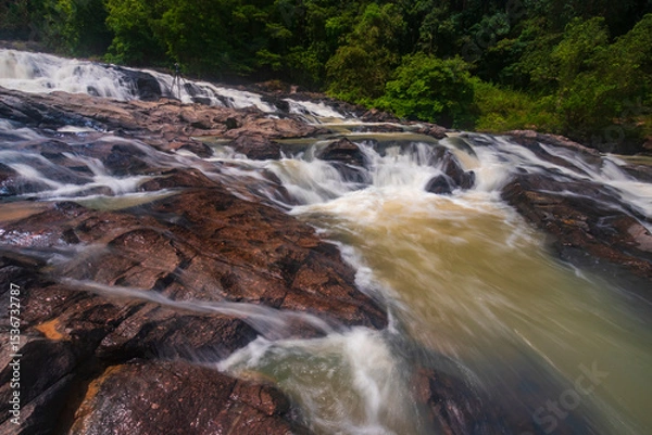 Obraz waterfall cascades over the rocks