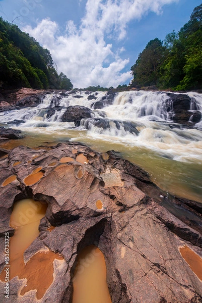 Obraz waterfall cascades over the rocks