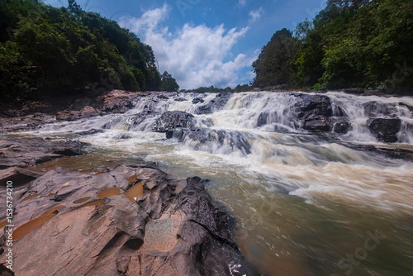 Obraz waterfall cascades over the rocks