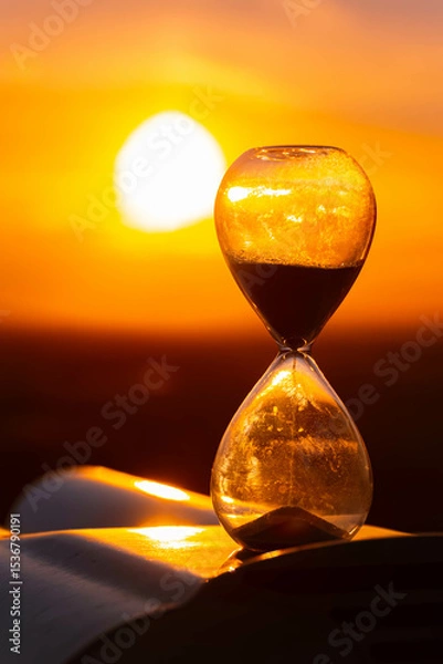 Obraz Summer sunset or sundowner view with an hourglass at Mount Bogenberg, Bogen, Danube, Straubing-Bogen, Bavaria, Germany