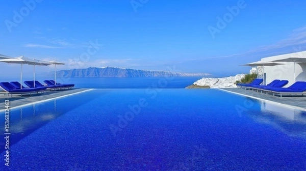 Fototapeta Infinity pool with panoramic ocean views.