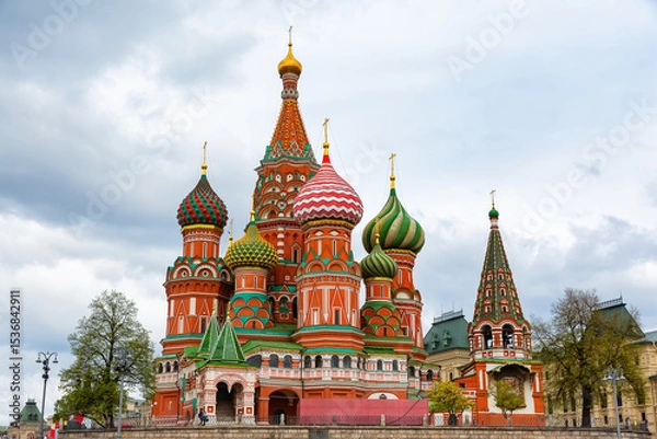 Fototapeta Saint Basil's Cathedral on Red Square against dramatic sky in Moscow, Russia. Beautiful old architectural building in Moscow in Russian Federation.