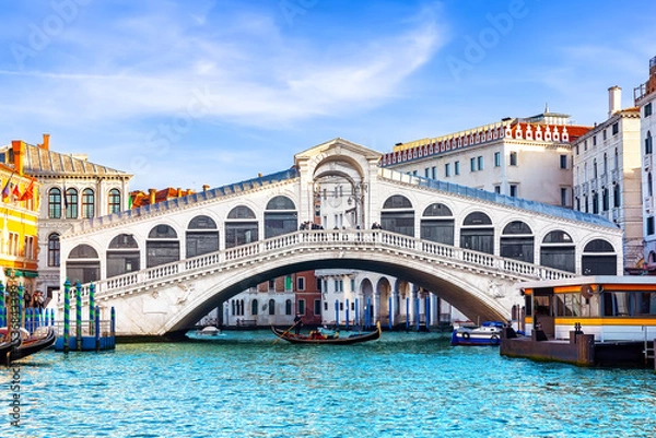 Fototapeta View of Grand Canal with Rialto Bridge in Venice, Italy. Landscape with  Rialto Bridge and gondola on the Grand Canal in Venice, Italy, Europe.