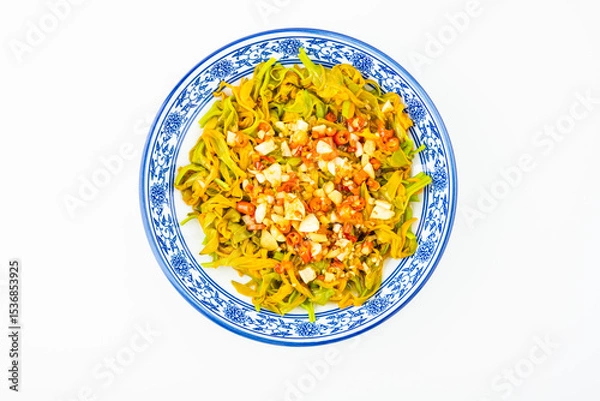 Fototapeta A dish of salad daylily on a white background