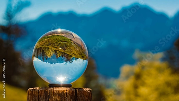 Obraz Crystal ball alpine spring landscape shot with Mount Wilder Kaiser in the background at Kaiserlift Kufstein, Tyrol, Austria