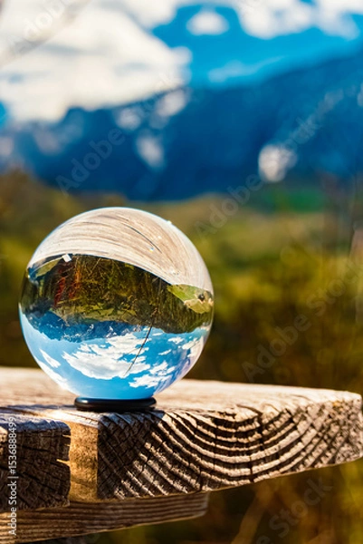 Obraz Crystal ball alpine spring landscape shot with Mount Wilder Kaiser in the background at Kaiserlift Kufstein, Tyrol, Austria