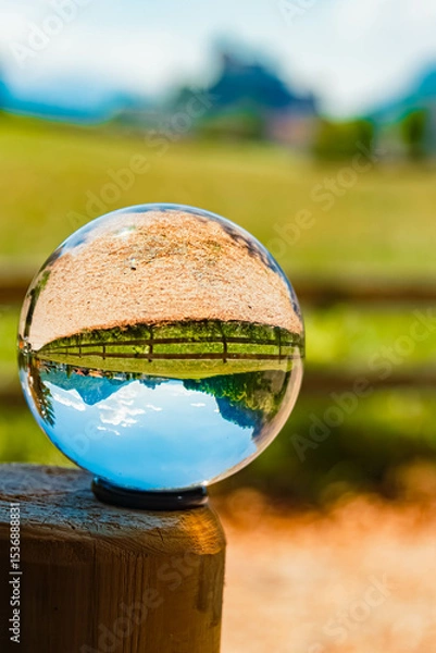 Obraz Crystal ball alpine spring landscape shot with a fortress in the background at Kufstein, Tyrol, Austria