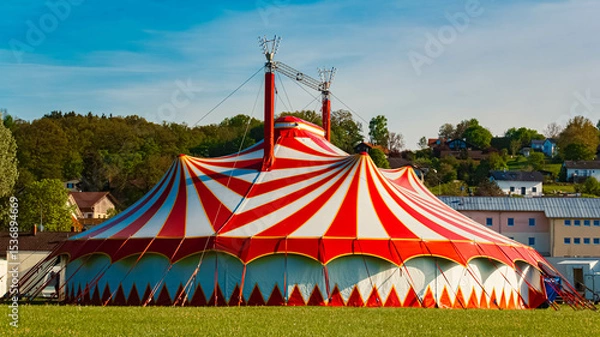 Obraz Spring landscape with a red and white circus tent on a sunny day at Postmuenster, Rottal Inn, Bavaria, Germany