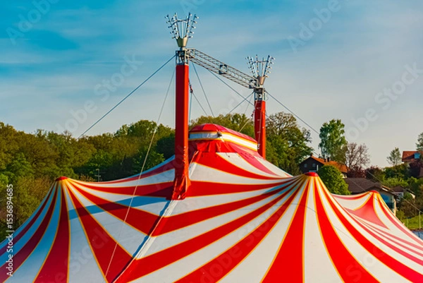 Obraz Spring landscape with a red and white circus tent on a sunny day at Postmuenster, Rottal Inn, Bavaria, Germany