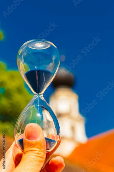 Obraz Hourglass landscape shot with a church in the background at Sankt Salvator, Bad Griesbach im Rottal, Passau, Bavaria, Germany