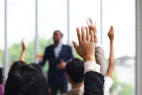 Fototapeta Question and answer audience or crowd : Active participation Asian man raise hands to ask questions attending seminar in conference meeting and training