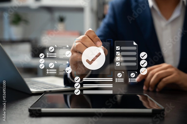 Fototapeta Online survey and checklist assessment, Digital questionnaire, Businessman use tablet to complete a digital form, making evaluation and selecting correct answers marked with check marks.
