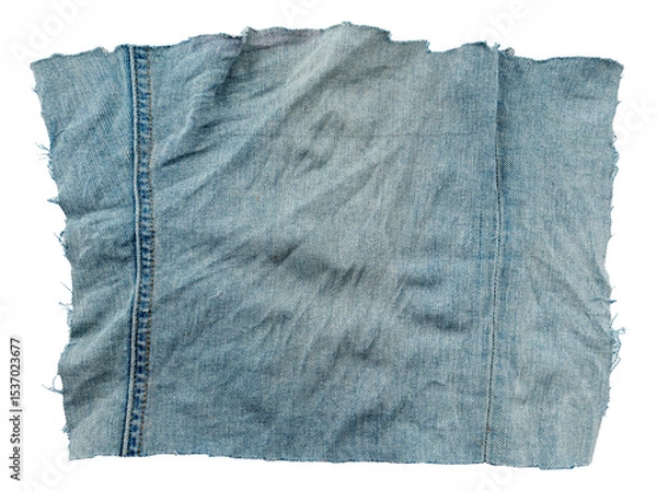 Fototapeta Piece of torn denim on a white background. Denim texture