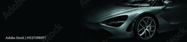 Fototapeta Detail on one of the LED headlights super car.copy space