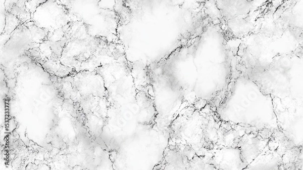 Obraz A close-up view of a white marble surface with gray veining. The texture is smooth and polished, showcasing natural patterns and variations in color.