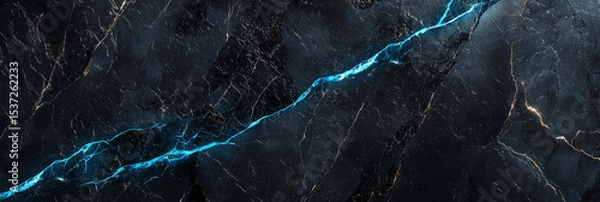 Fototapeta Dark grey marble with unexpected neon blue cracks.