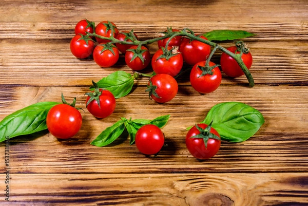 Fototapeta Heap of small cherry tomatoes on wooden table