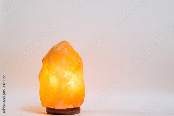 Obraz Himalayan salt lamp on white background with copy space.
