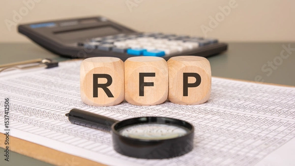 Obraz RFP wooden blocks on financial spreadsheet background